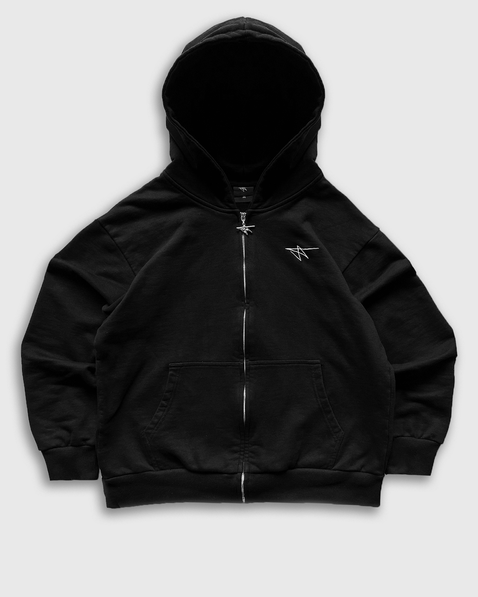 A black hooded sweatshirt with a front pouch, featuring an embroidered logo on the chest and a metallic zipper.