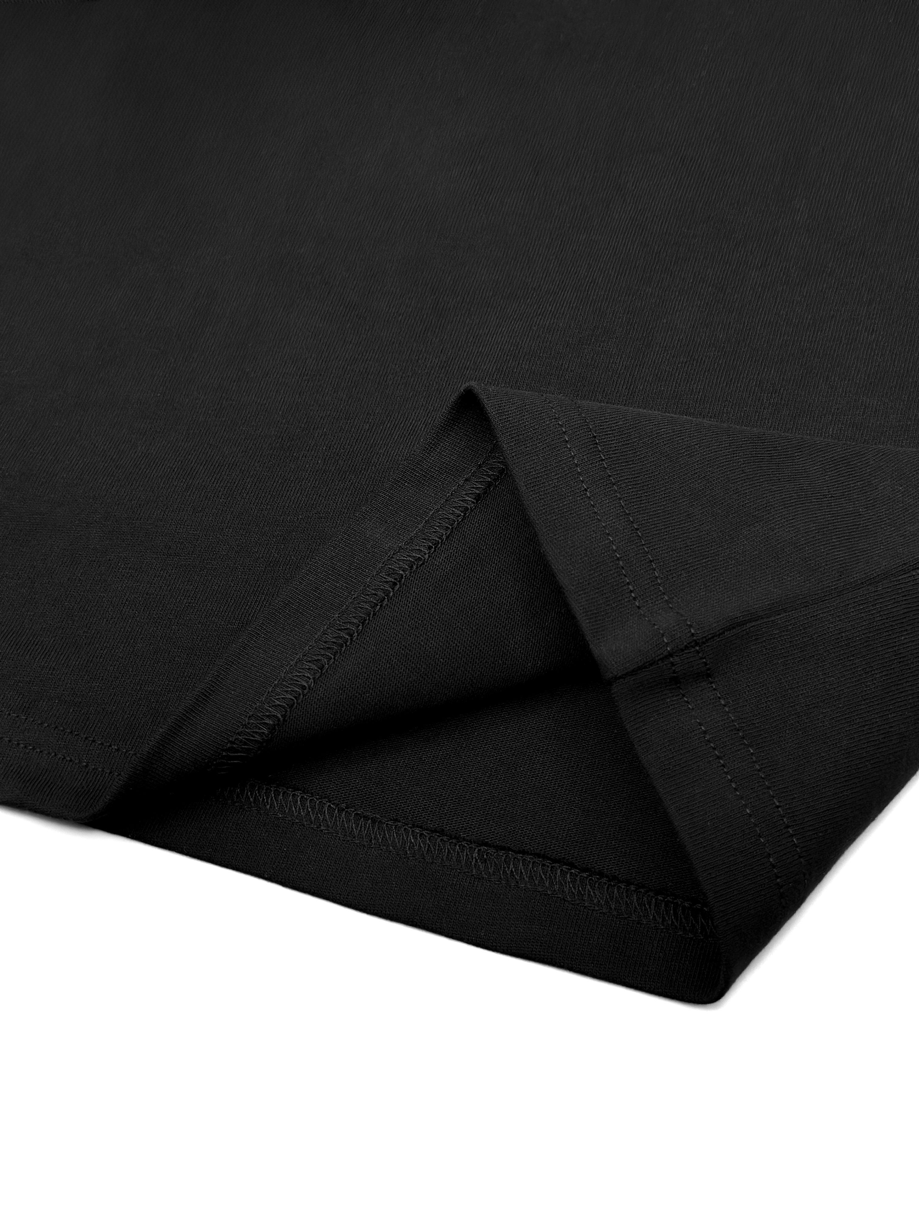 Black fabric with a subtle pattern on a white background