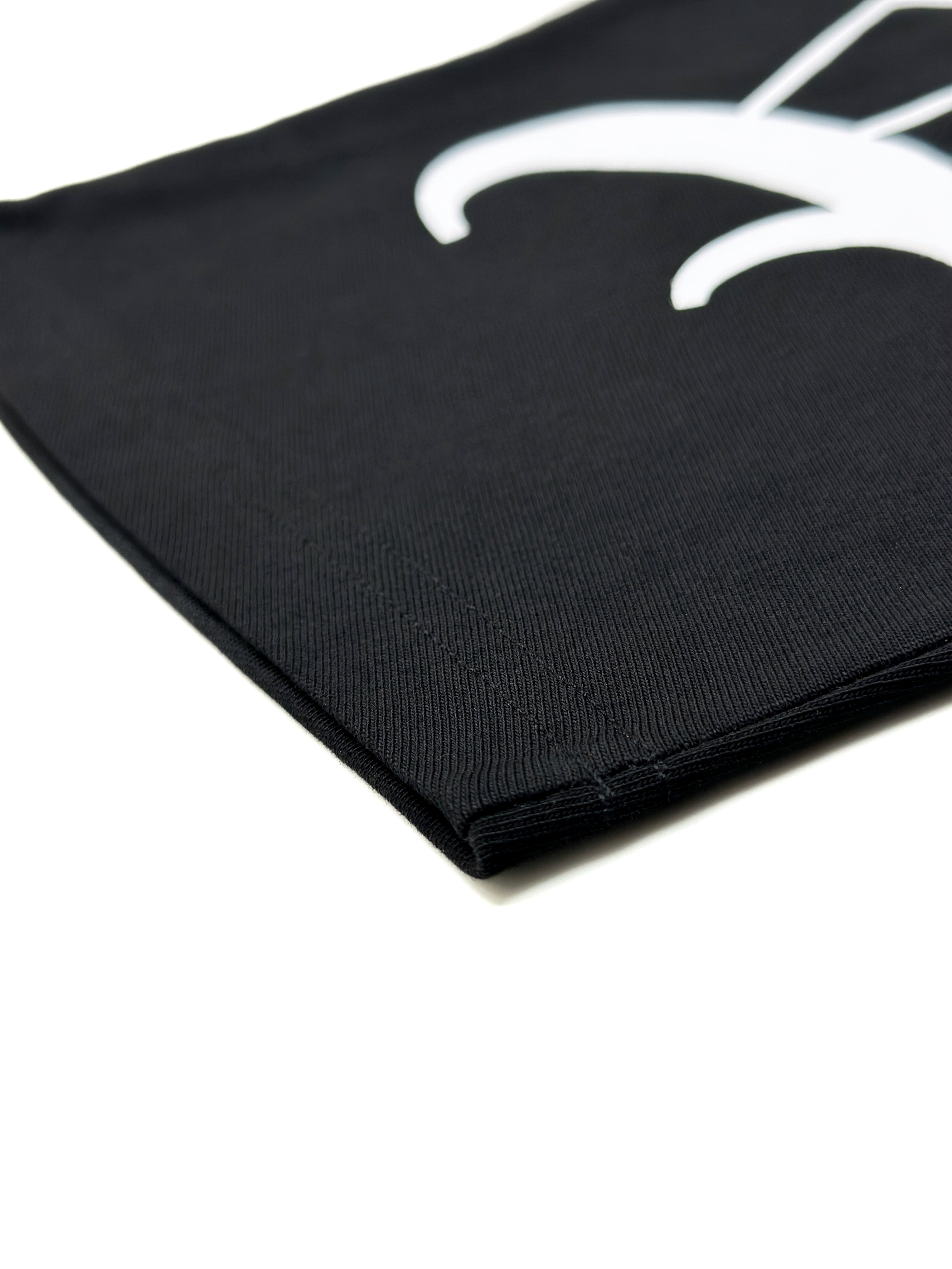 Black fabric with a white logo on a white background