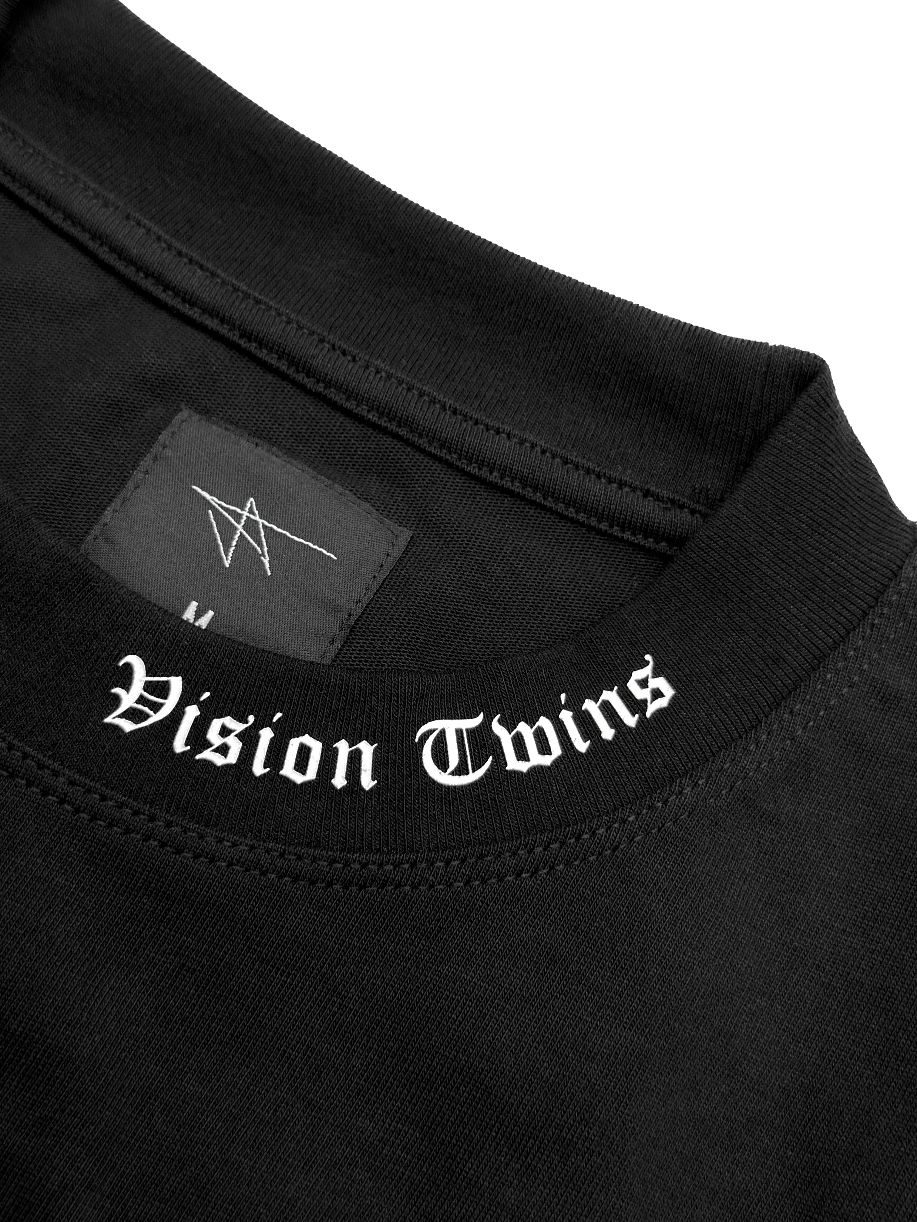 Black t-shirt with 'Vision Twins' logo on a white background
